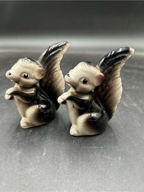 Vintage skunk salt and pepper shakers Pair